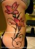 Tattoo flor feminina.